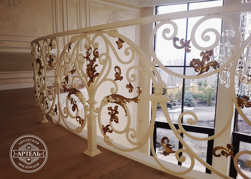 White wrought iron balconies with gilding s. Foresters Kiev region