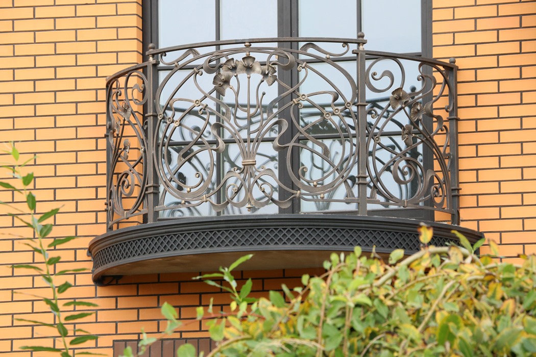 Bronze-patinated wrought-iron balcony railing with. Kryukovshchina Kiev region