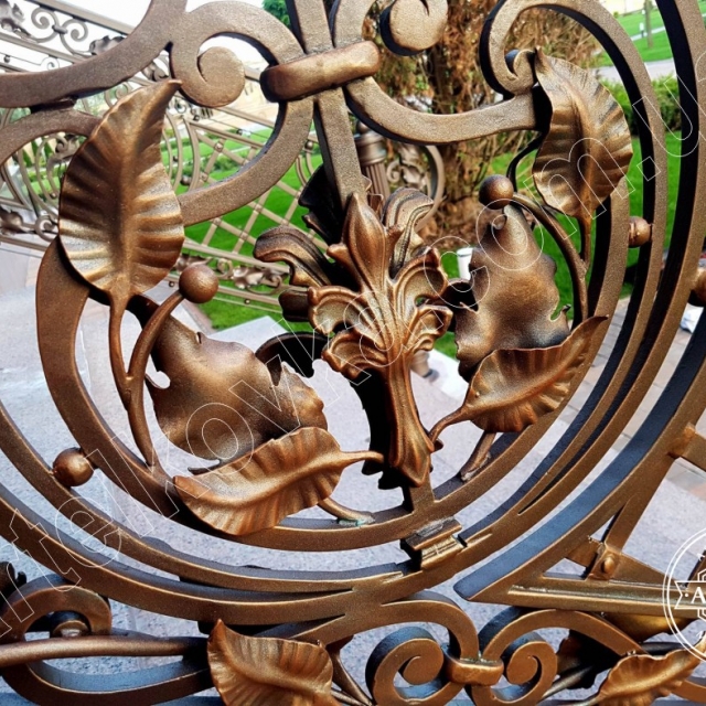 Patination of a wrought iron fence