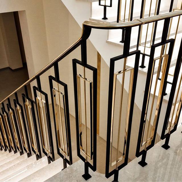 Beautiful staircase with brass handrail